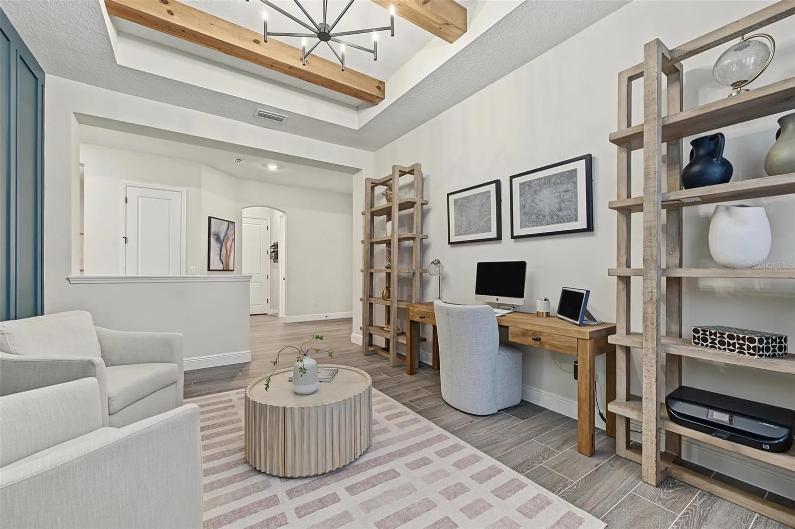 Exposed beams add a great touch to the home office