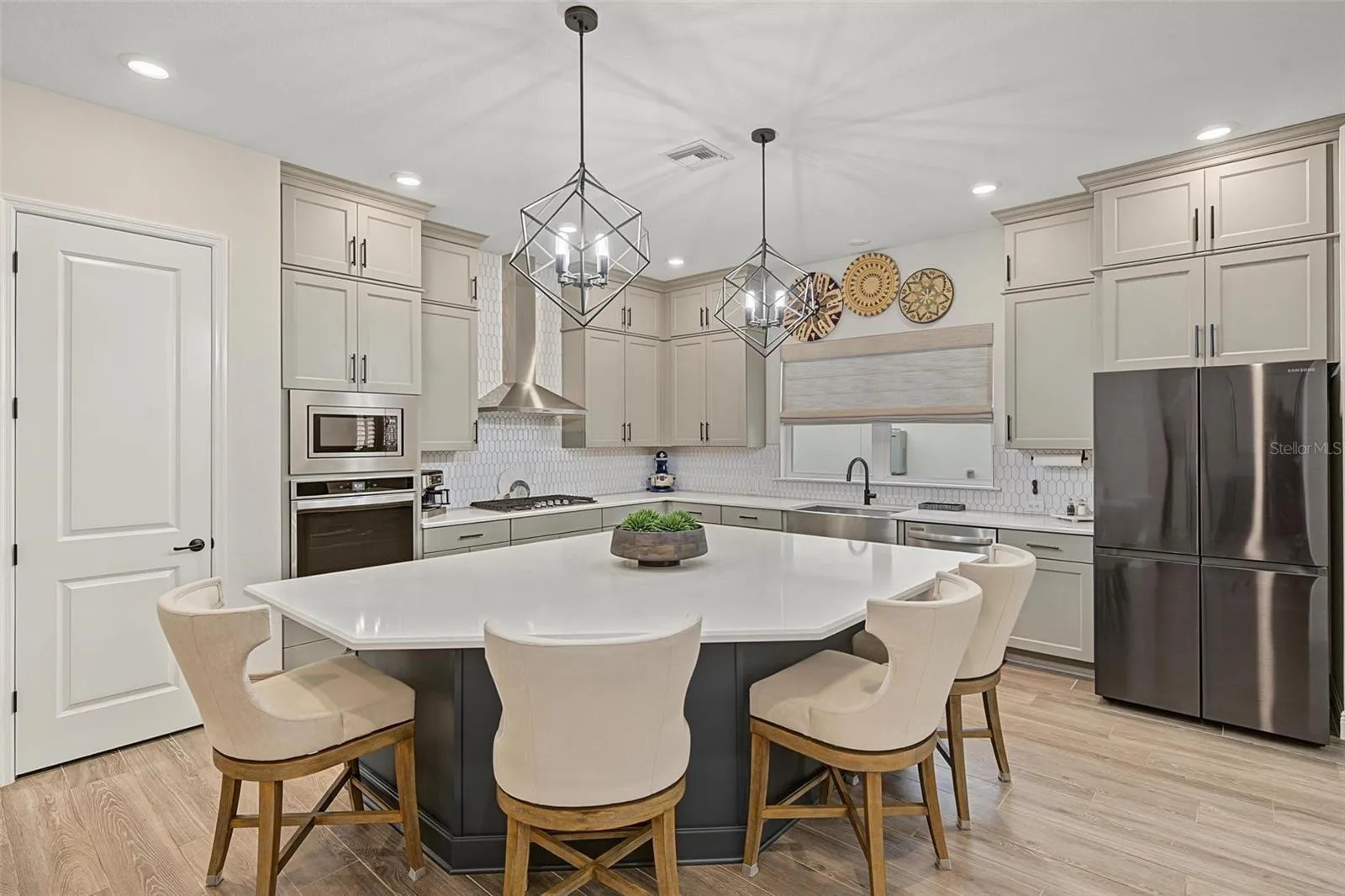 Oversized island with breakfast bar seating