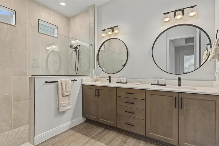 Primary bathroom with double vanity for additional storage options