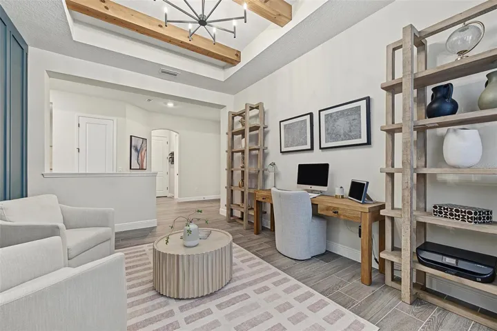 Exposed beams add a great touch to the home office