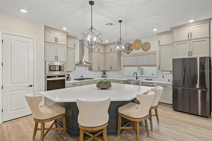 Oversized island with breakfast bar seating