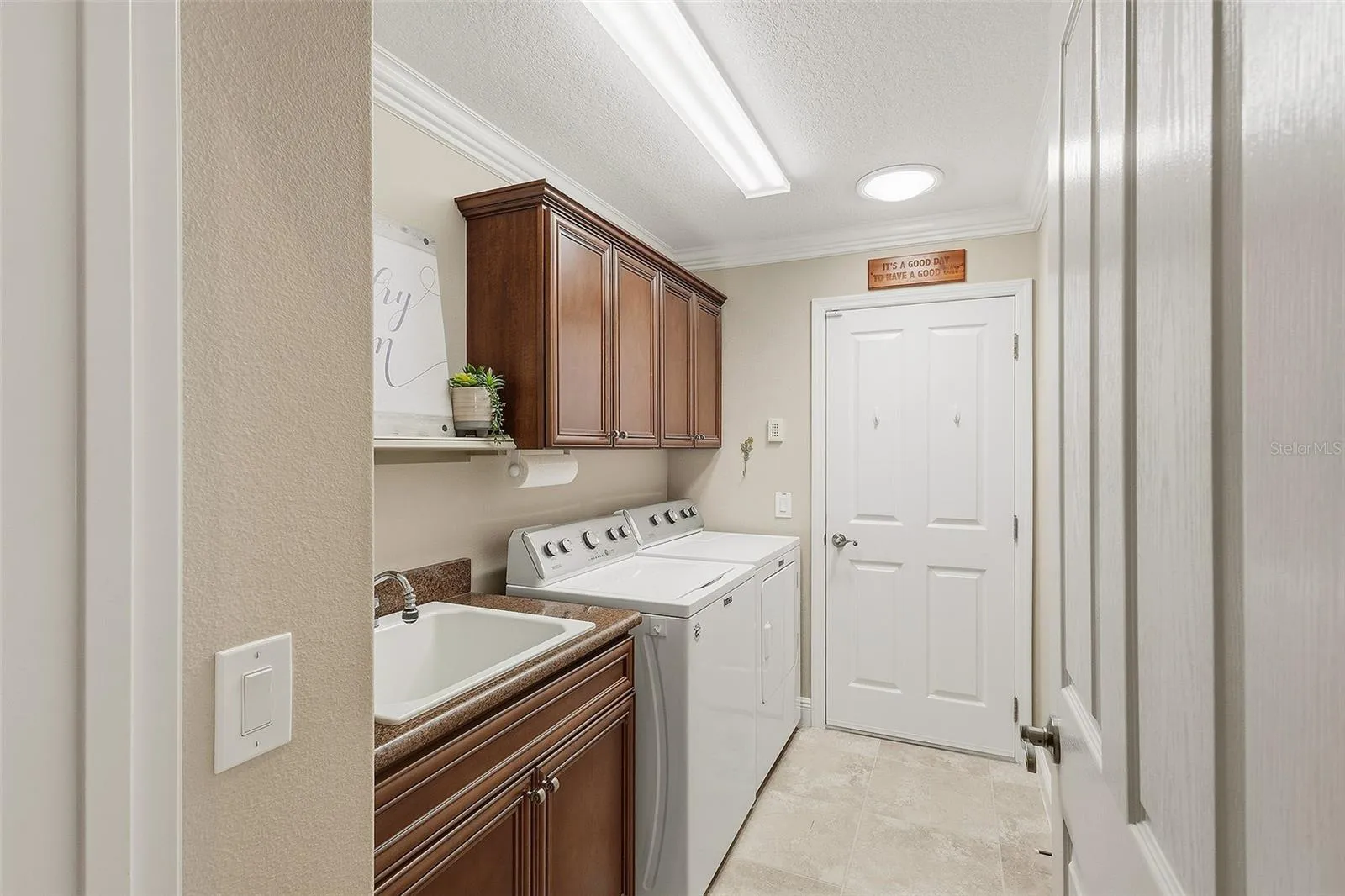 laundry room - granite top - cabinet storage