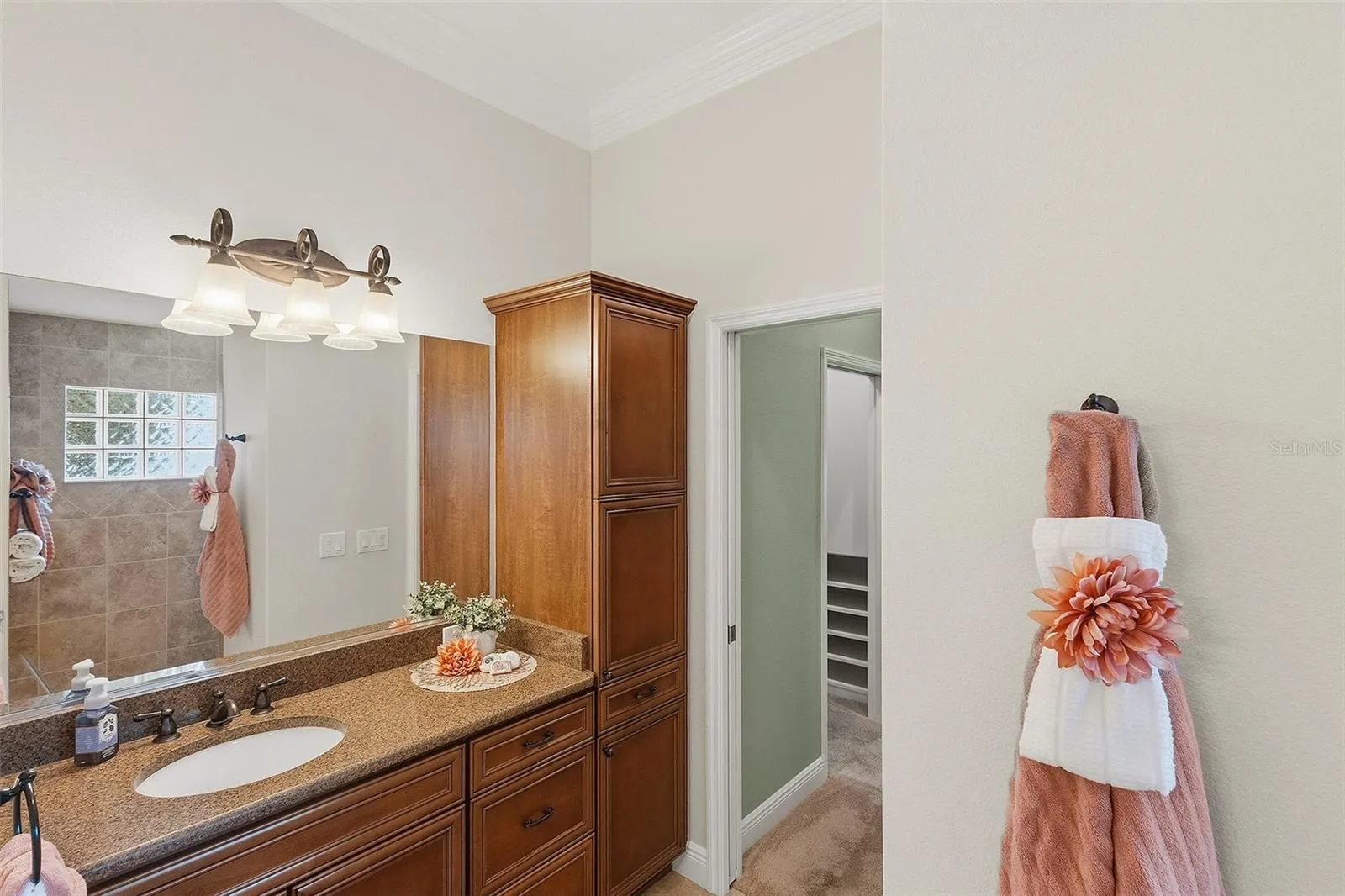 double vanity in primary bathroom - cabinet storage