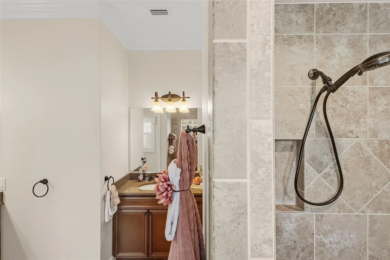 walk-in shower with bench