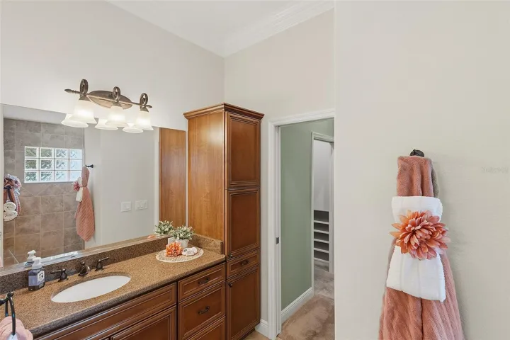 double vanity in primary bathroom - cabinet storage