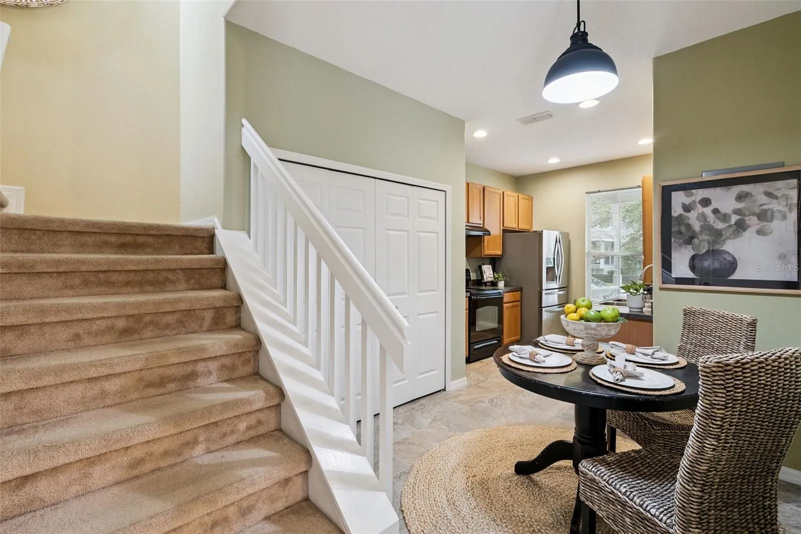 Dinette in Kitchen with Built-In Closet for Washer and Dryer