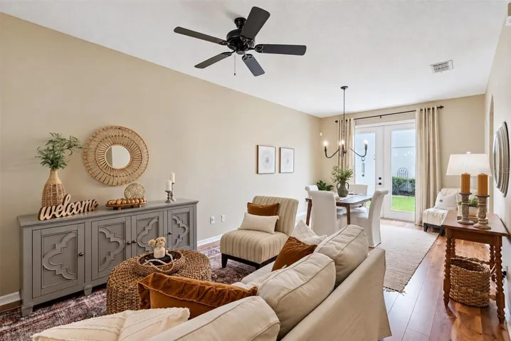Family/Dining Room with French Doors Leading to Backyard