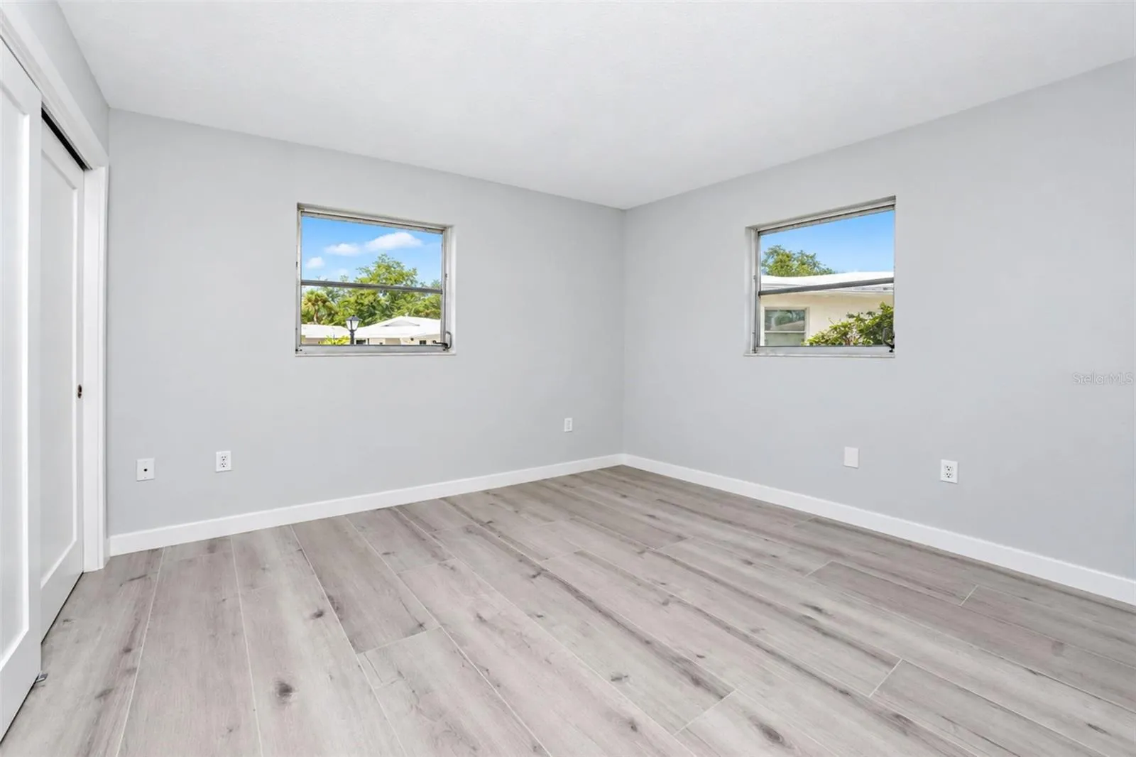 A bright and welcoming Guest Room with full closet and bath nearby.