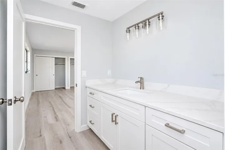 Quartz counter with generous cabinety storage in the new mission sytyle cabinetry.