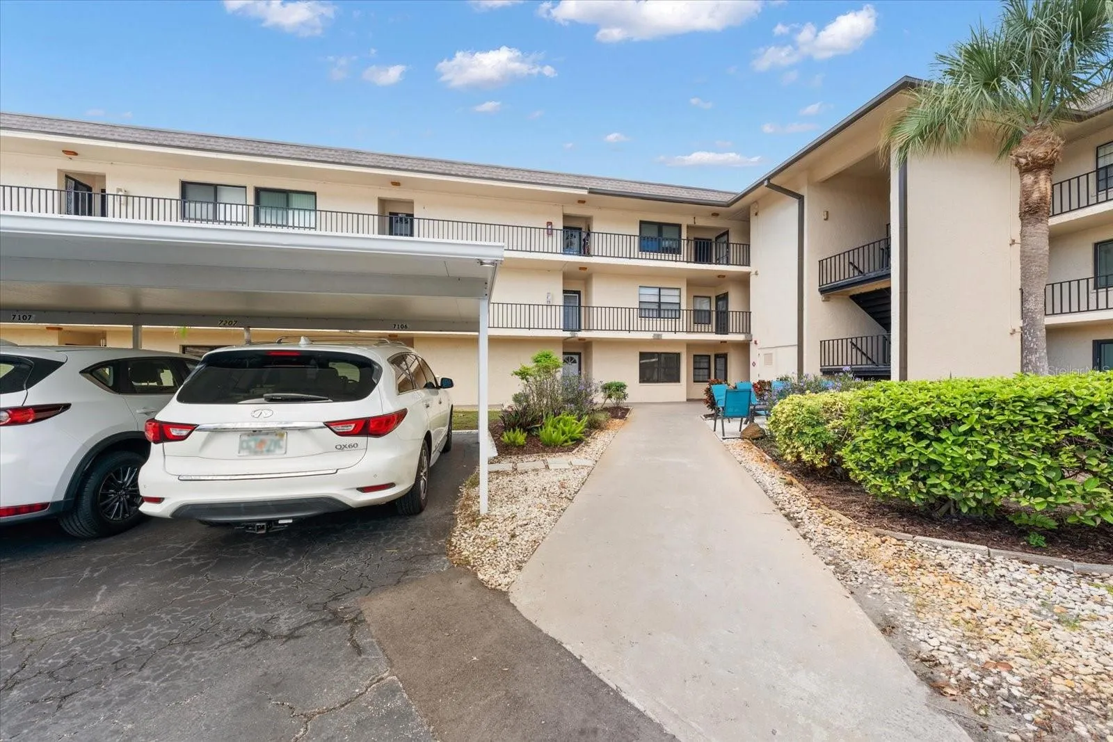 CARPORT CONVENIENTLY LOCATED RIGHT OUTSIDE THE FRONT DOOR TO THIS CONDO