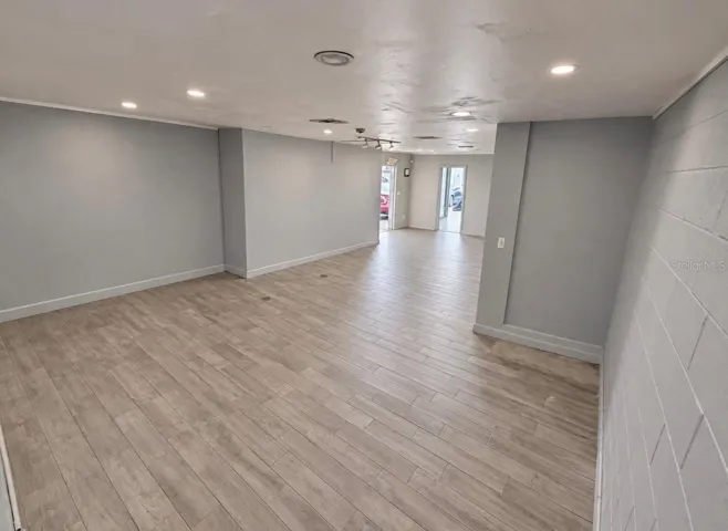 Office 3: left-hand door leading outside and door leading to other offices.   (32x18)