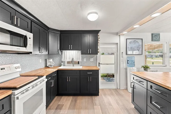 GORGEOUS kitchen with butcher block countertop