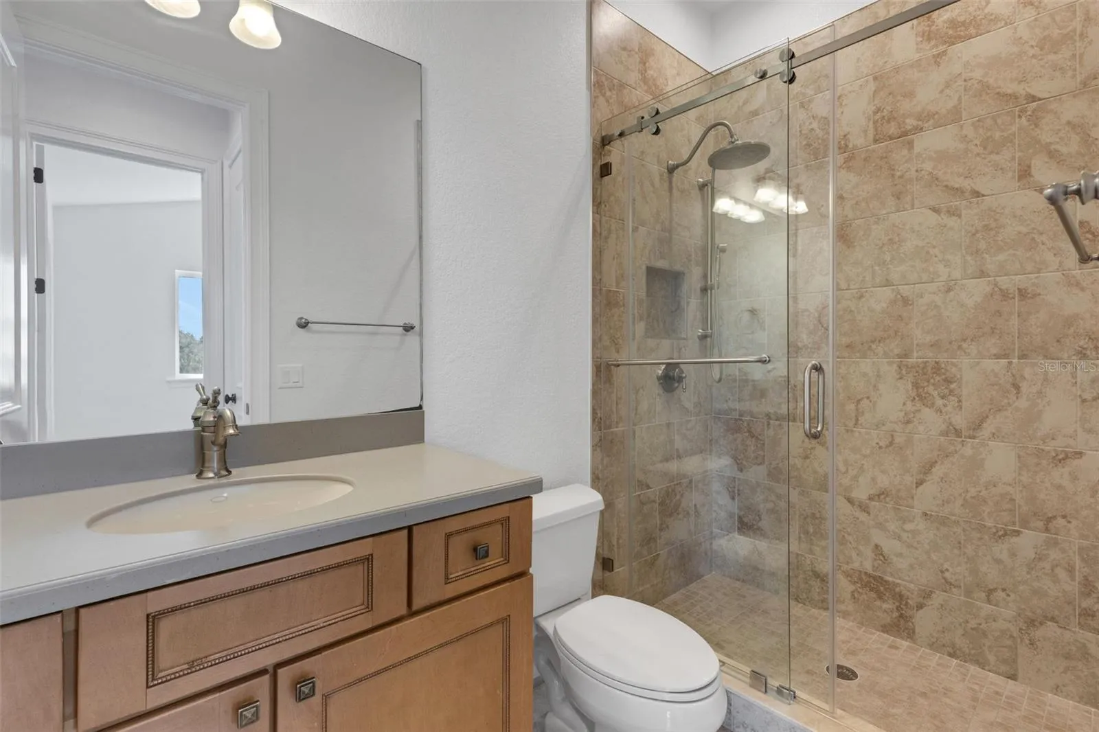Bathroom# 4 has a fully tiled shower with European glass enclosure system.