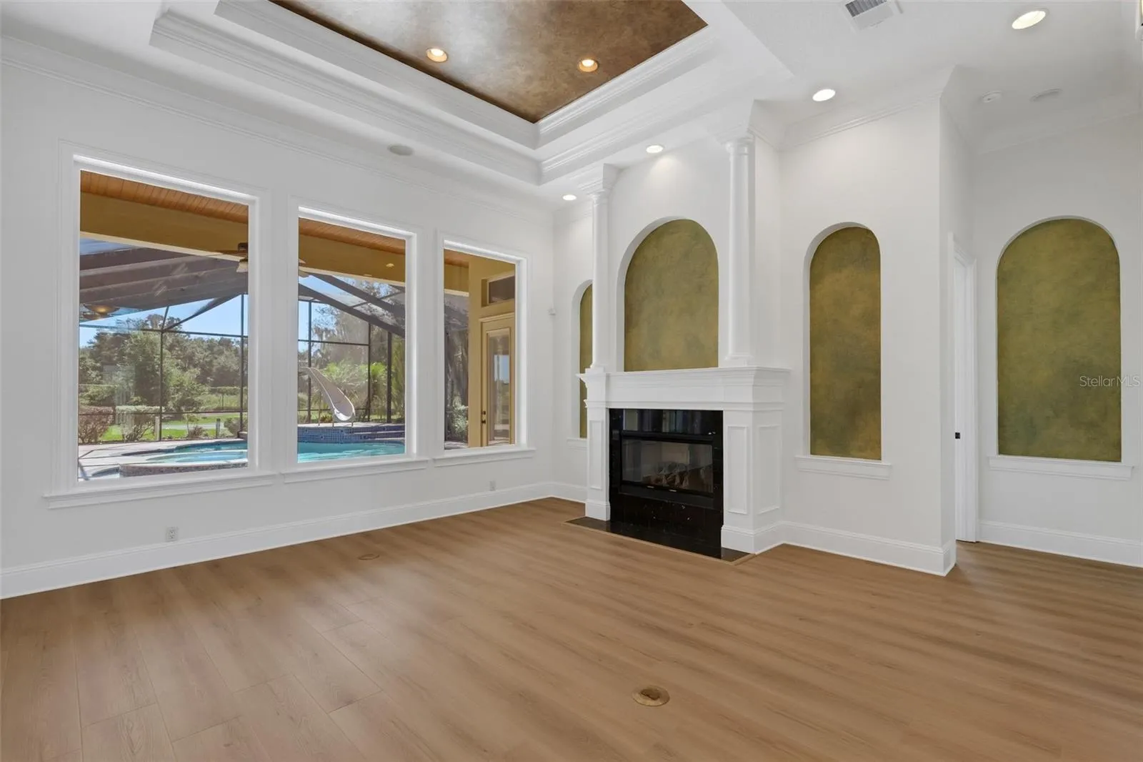 Architectural details abound and there are two gas fireplaces in the residence.