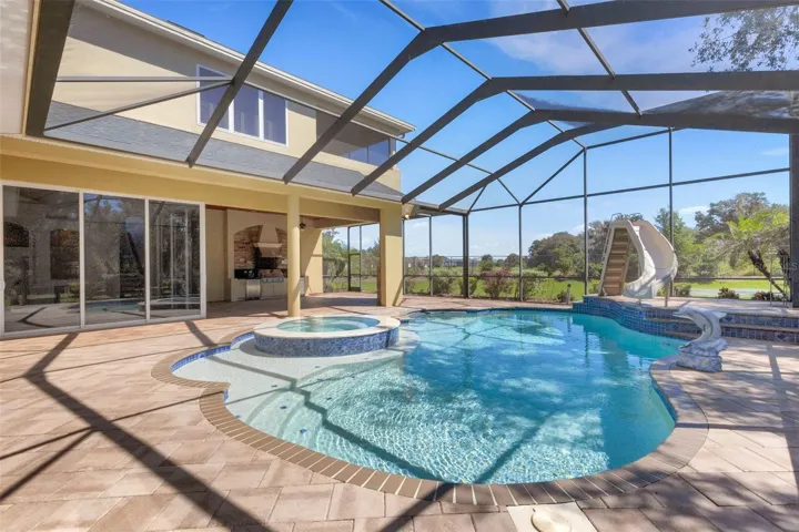 All completely screen enclosed with brick pavers all around.