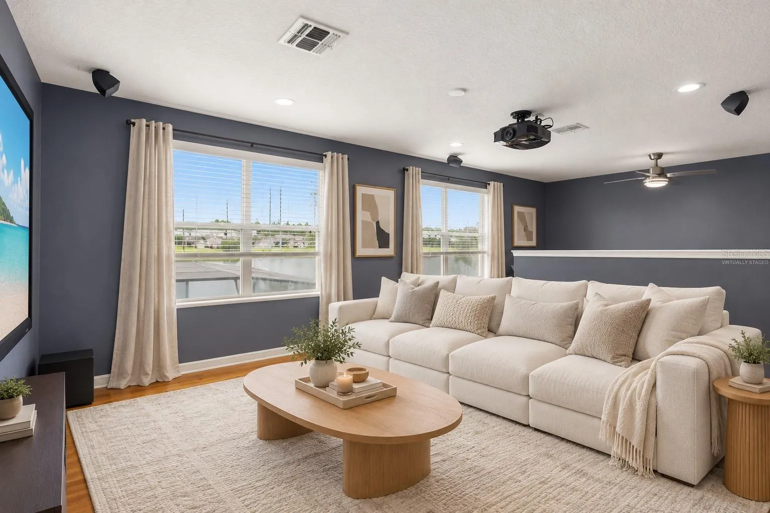 Virtually Staged: The builder’s optional oversized bonus room includes a partially divided area and provides plenty of space for a media room, home office, gym, playroom or potential 5th bedroom.