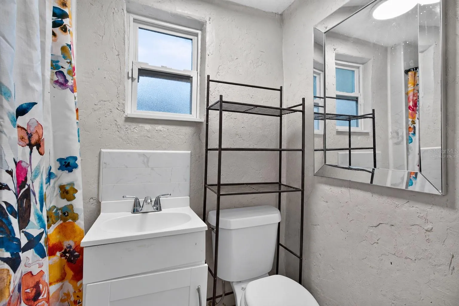 Virtually Staged. Personal Items digitally removed. En-Suite Bathroom