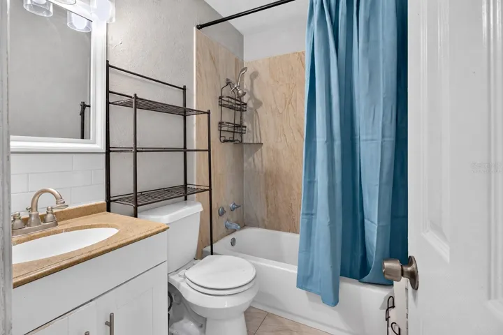 Virtually Staged. Personal Items digitally removed. Bathroom