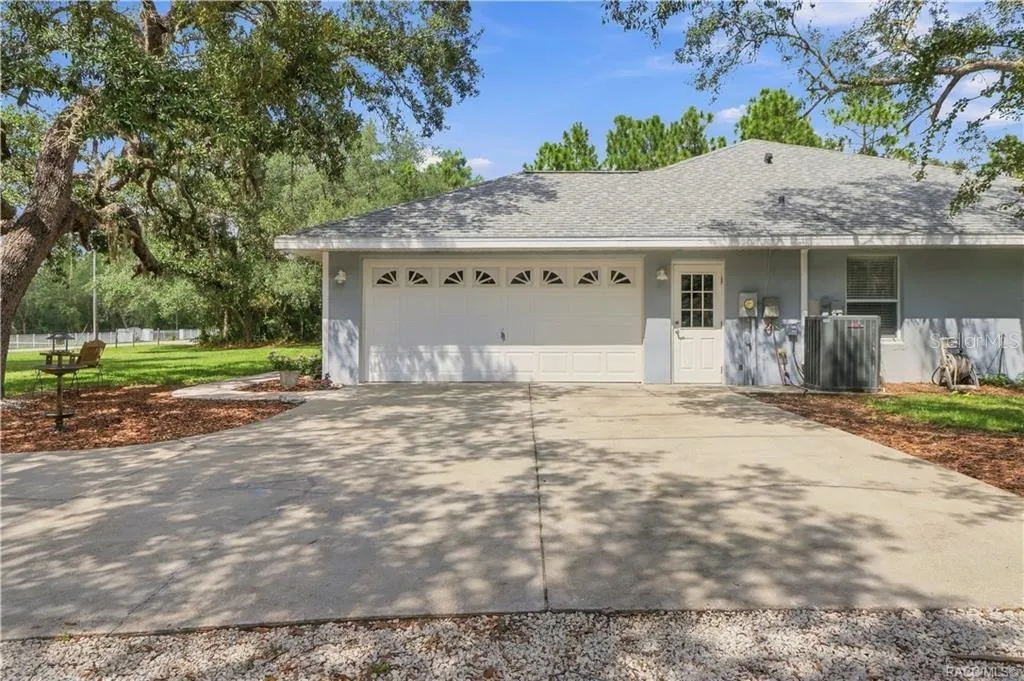 Attached Garage – BRAND NEW ROOF 2026 – Attached 2-car garage with generous driveway space, side entry.
