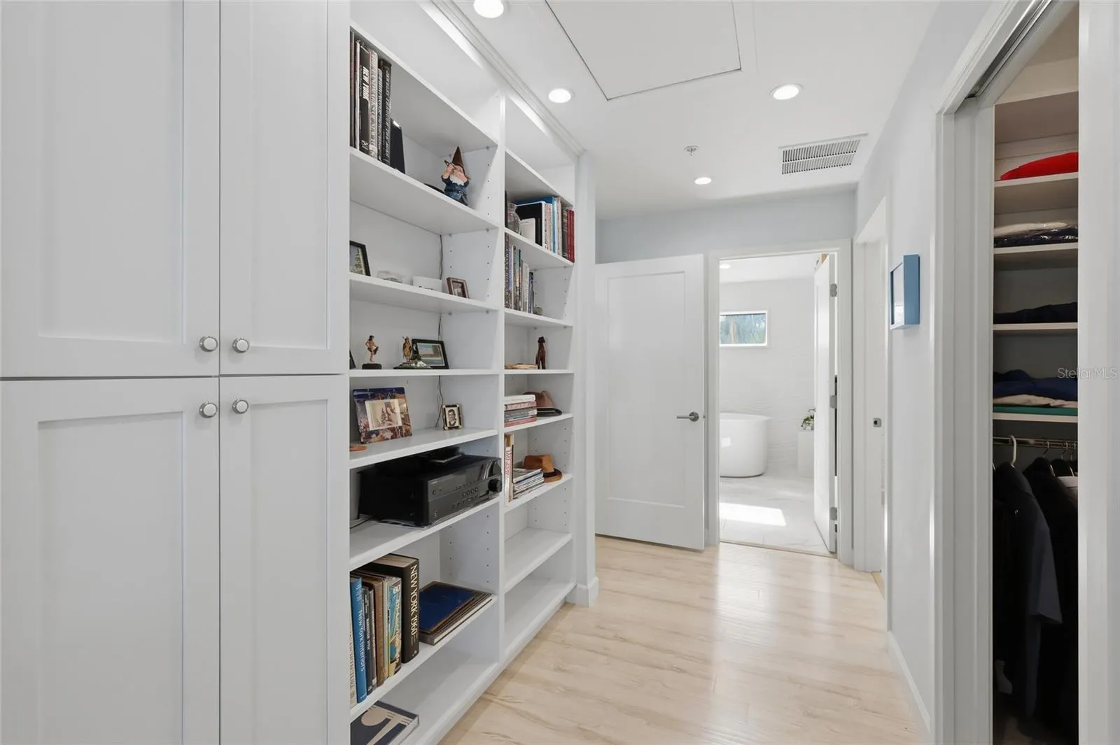 Bookcases to Primary Suite.