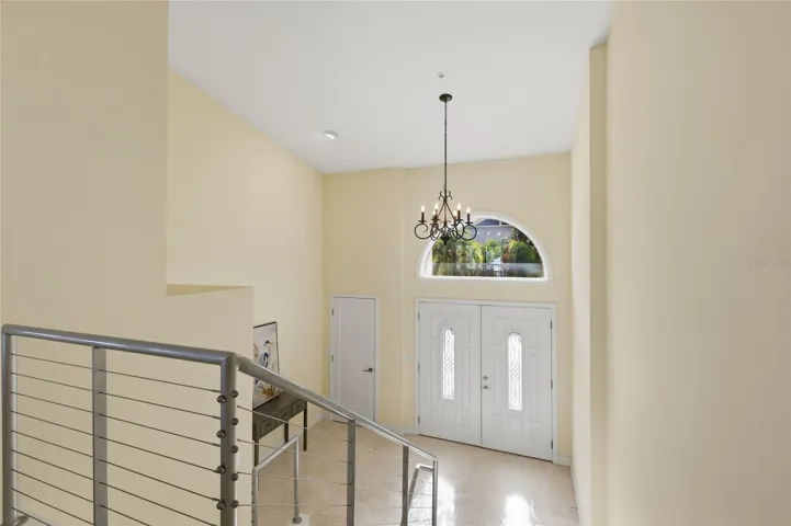 View to Foyer and Double Door Entry.