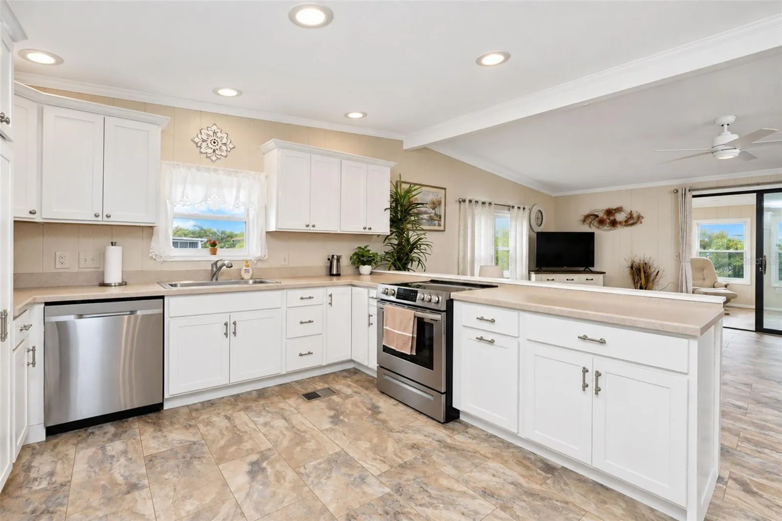 The upgraded countertops are stylish and neutral.
