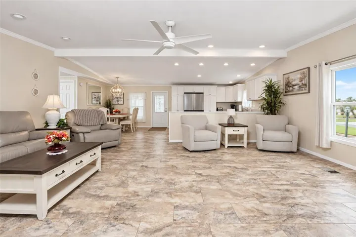 The view from the Florida room into the living room and dining/kitchen area.