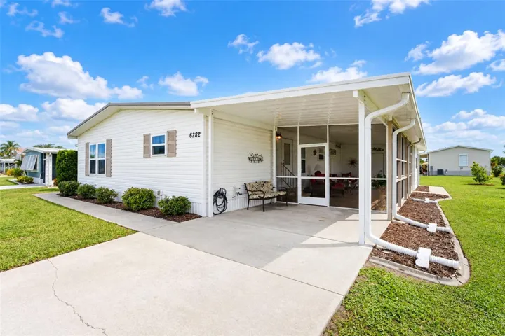 The screened lanai and covered area provide plenty of room for entertaining!
