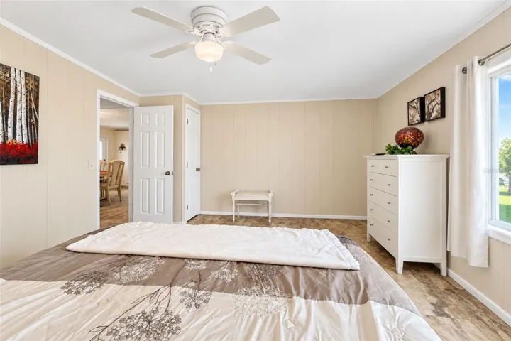 The guest bedroom has a wall closet and feels welcoming!