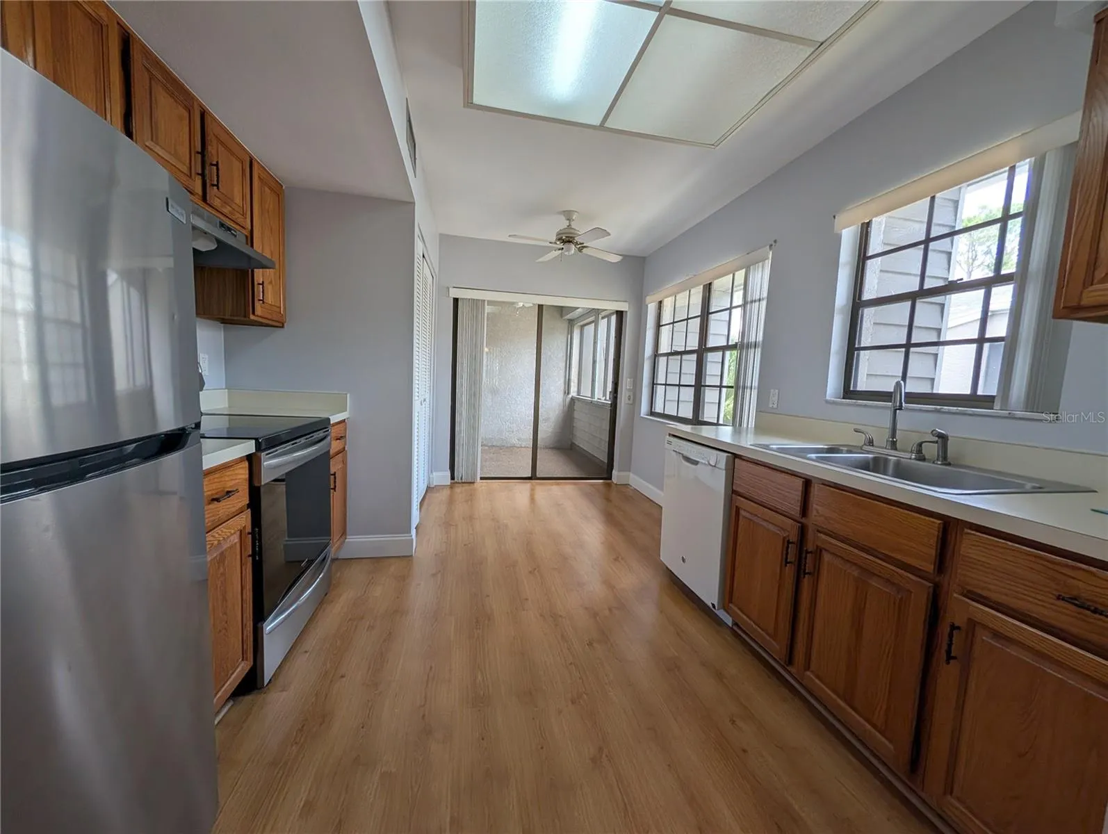 Kitchen with slider to screened patio