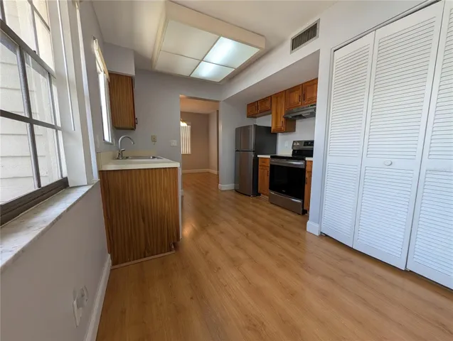 Kitchen with laundry closet