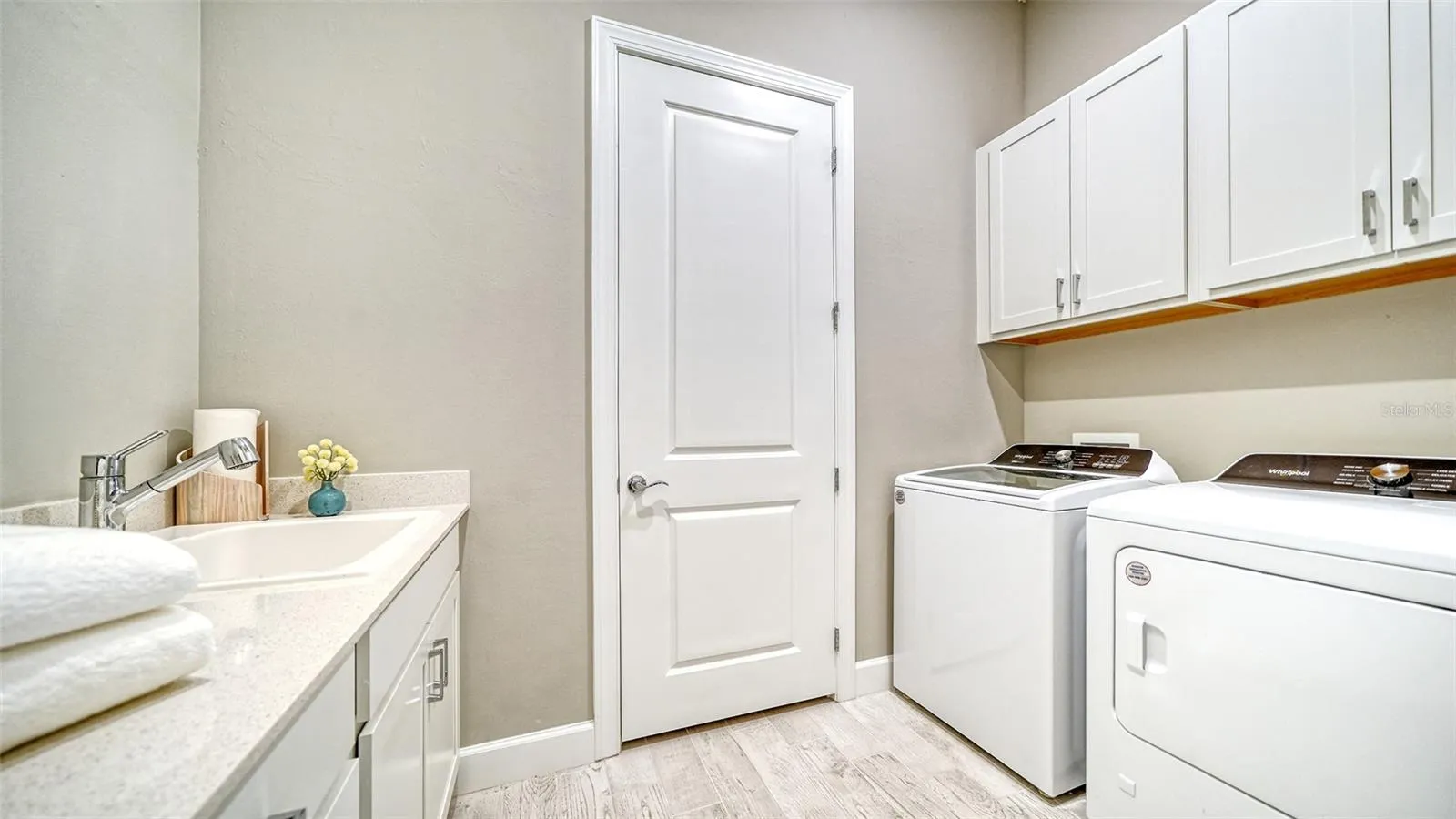 Laundry room with sink