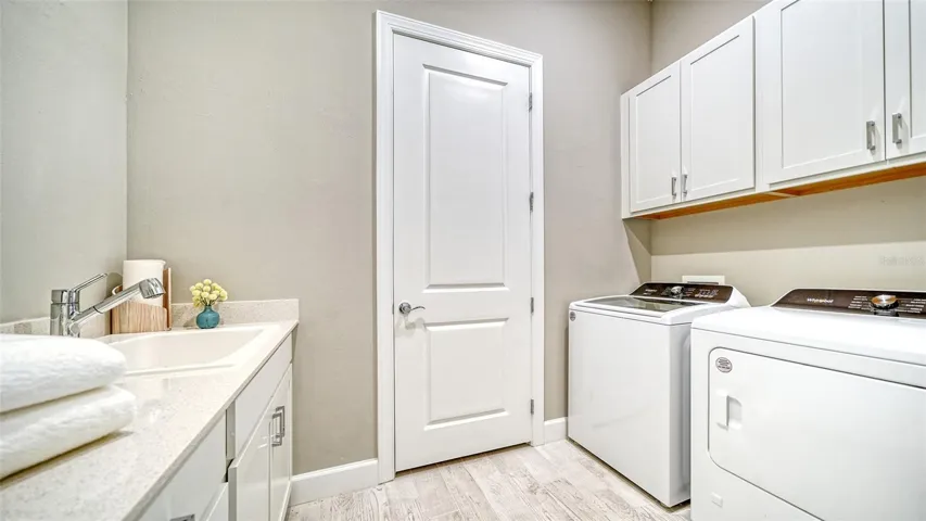 Laundry room with sink
