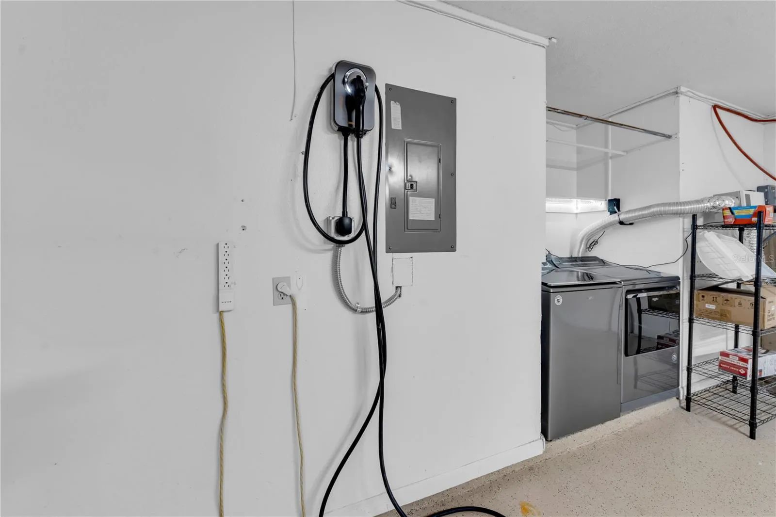 Electric vehicle charger in garage