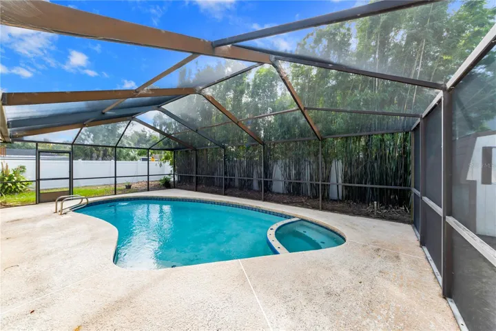 Screened patio at back of home