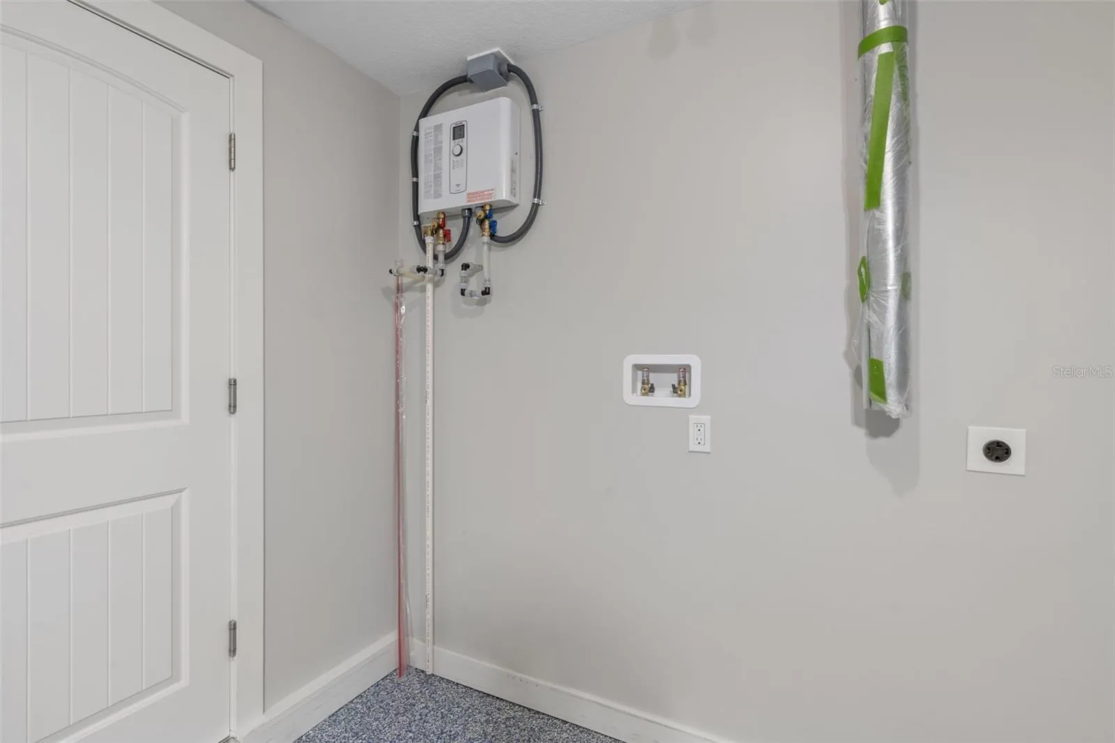 BRAND NEW on demand hot water heater