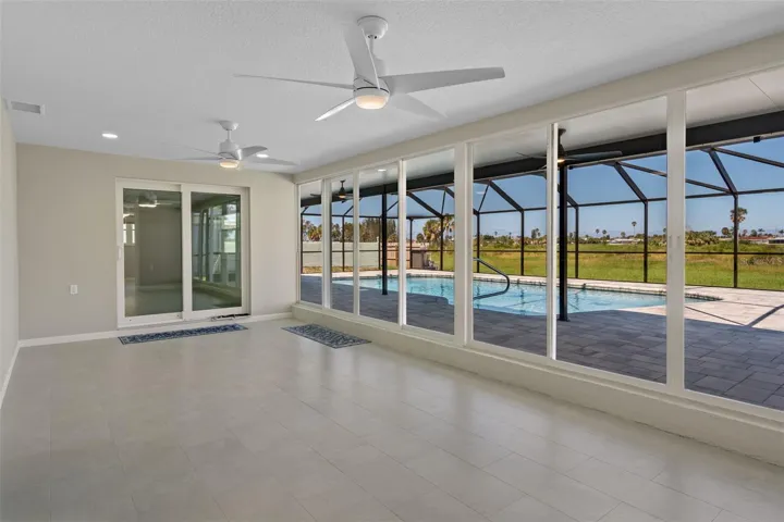 Florida room with access to pool