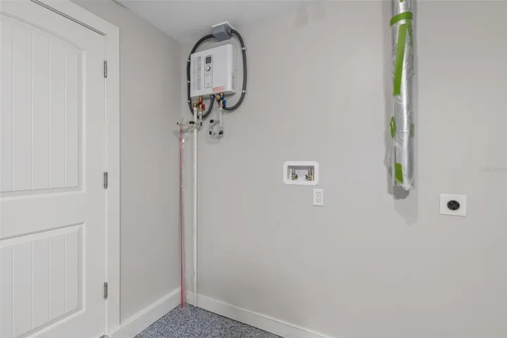 BRAND NEW on demand hot water heater