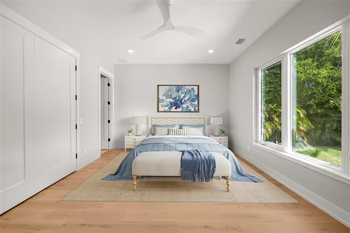 Virtually staged first floor additional bedroom suite offering privacy, comfort, and additional full bathroom.