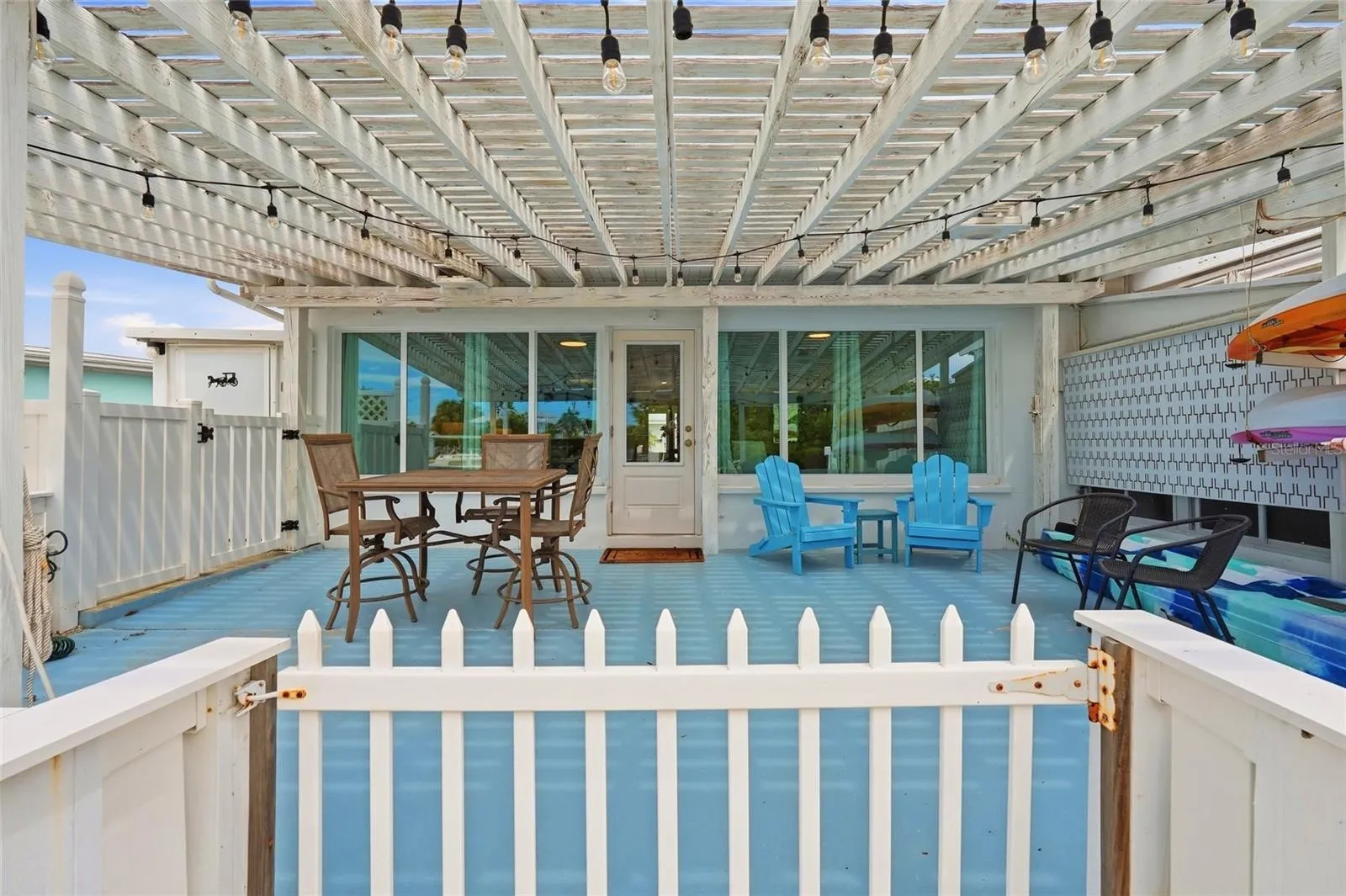 UNDER COVER PATIO SPACE.