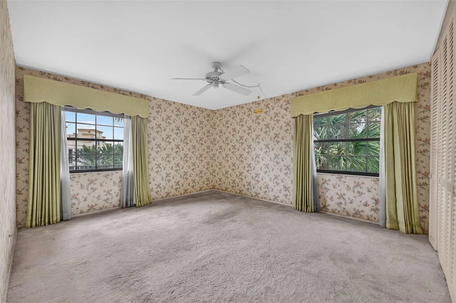 Primary Suite with tree top views