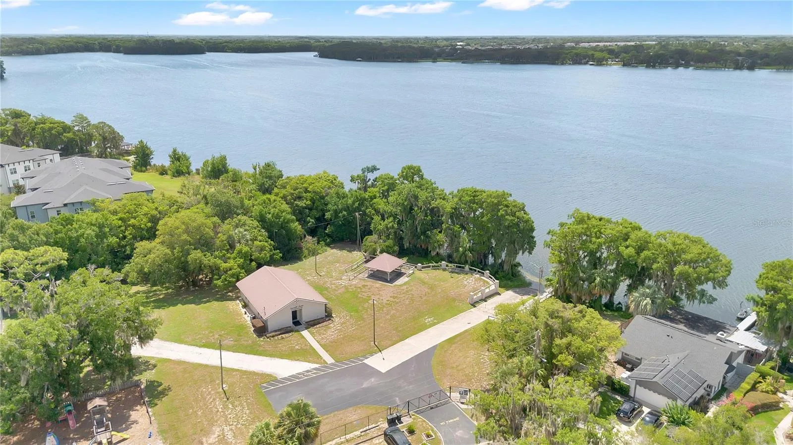 Aerial view of Sausalito Shores Clubhouse, Pavilion and Boat Ramp on Lake Howell
