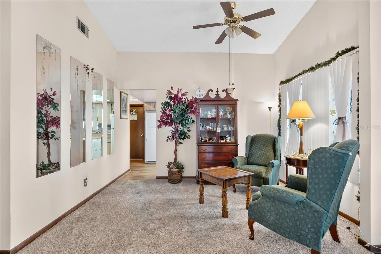 Looking towards dining room and kitchen