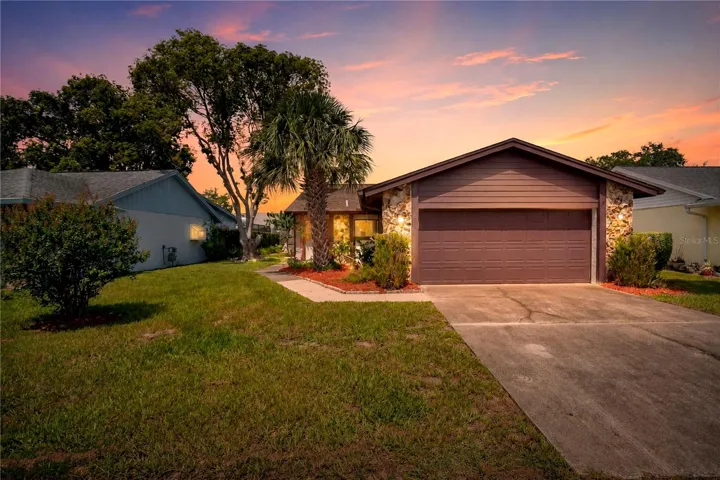 Twilight photo of front of 202 Doster Dr.