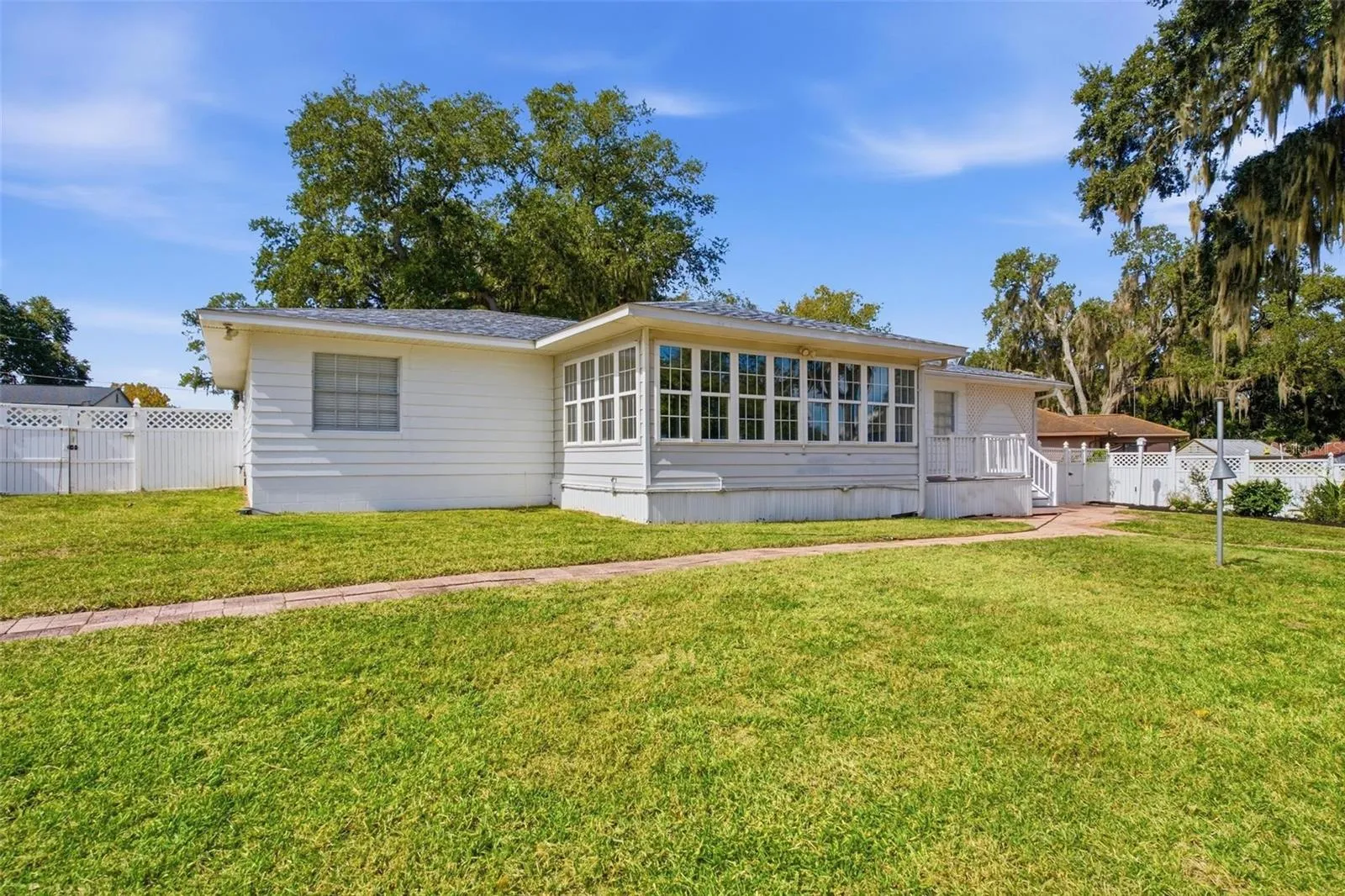 Rear exterior with spacious backyard