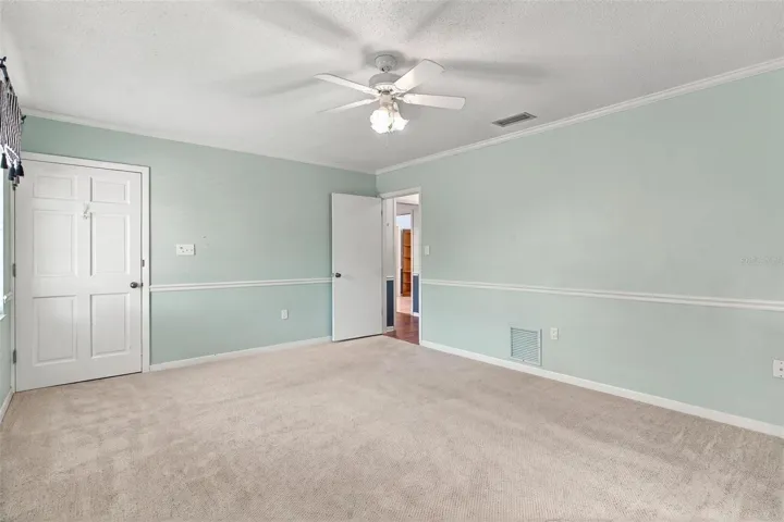 Spacious primary bedroom with walk-in closet