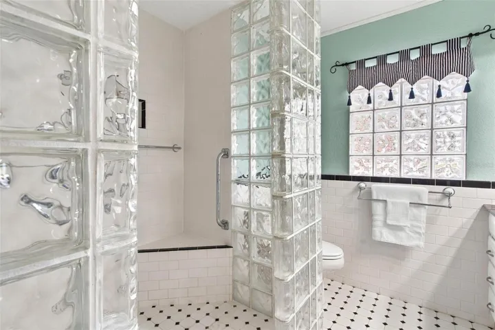 Primary bathroom with wheelchair-accessible shower