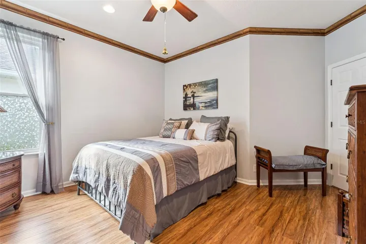 13' x 12' Bedroom #3 w/ engineered wood flooring, recessed lighting, ceiling fan &amp; a walk-in closet