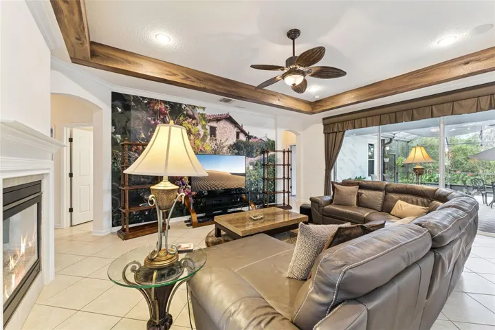 17' x 21' Family Room w/ recessed lighting, tray ceiling w/ painted border, ceiling fan &amp; electric floor outlet