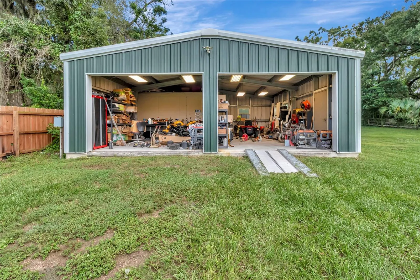 Large detached garage with air conditioned room